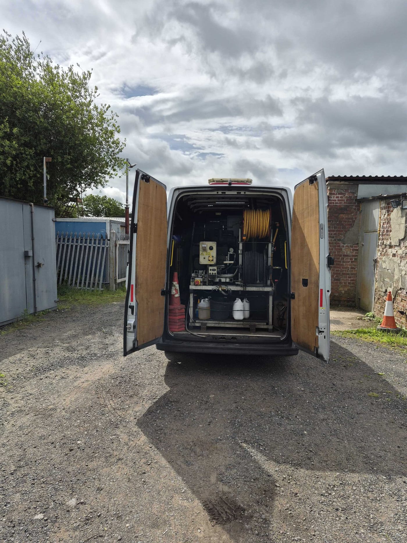 Self-contained pressure-wash rig — power, water and chemicals on board
